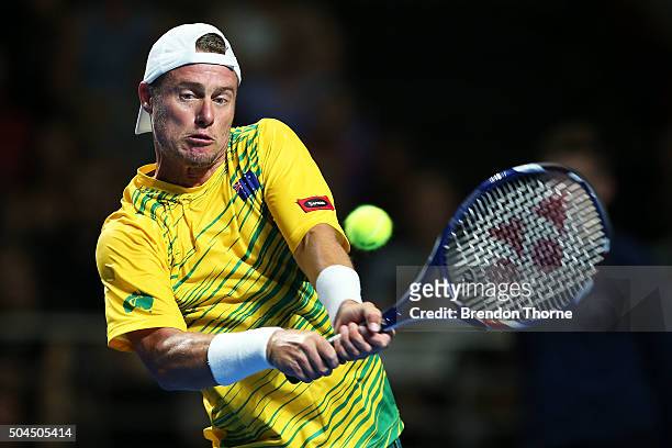 Lleyton Hewitt of Australia plays a backhand during the FAST4 Tennis exhibition match between Rafael Nadal and Lleyton Hewitt at Allphones Arena on...