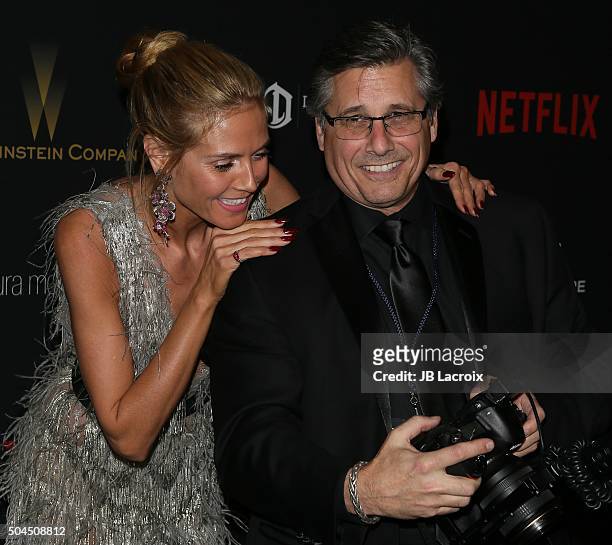 Heidi Klum and photographer Kevin Mazur attend The Weinstein Company and Netflix Golden Globe Party, presented with DeLeon Tequila, Laura Mercier,...