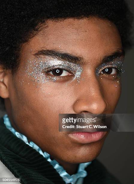 Models prepare backstage ahead of the Xander Zhou show during The London Collections Men AW16 at Victoria House on January 11, 2016 in London,...