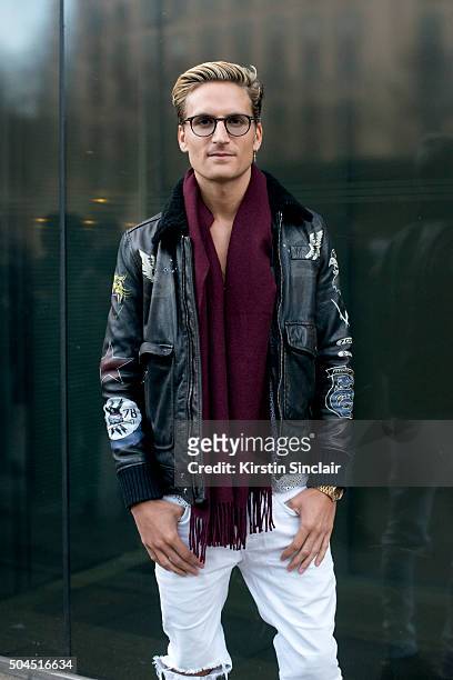 Made In Chelsea star Oliver Proudlock wears a Diesel jacket, River Island jeans, Sandro shirt, Whistles scarf, and Tom Ford eyewear on day 3 of...