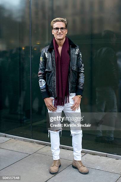 Made In Chelsea star Oliver Proudlock wears a Diesel jacket, River Island jeans, Sandro shirt, Whistles scarf, Red Wing boots and Tom Ford eyewear on...