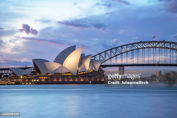 sydney waterfront at night - sydney stock pictures, royalty-free photos & images