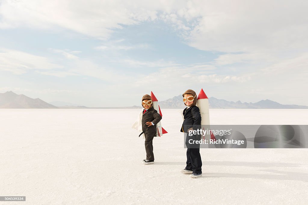 Young Business Boys Wearing Rockets