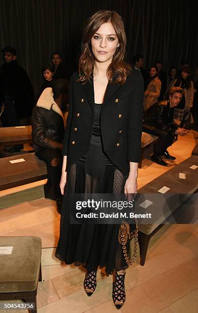 Amber Anderson attends the Burberry Menswear January 2016 Show on January 11, 2016 in London, United Kingdom.