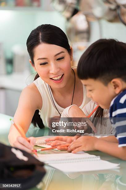 chinese schoolwork - asian teacher stock pictures, royalty-free photos & images