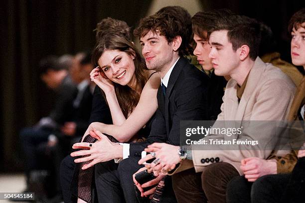 Amber Anderson and Josh Whitehouse attend the Burberry Prorsum show during The London Collections Men AW16 at Kensington Gardens on January 11, 2016...