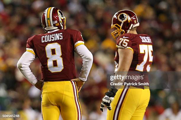Quarterback Kirk Cousins of the Washington Redskin looks on against the Green Bay Packers at FedExField on January 10, 2016 in Landover, Maryland.