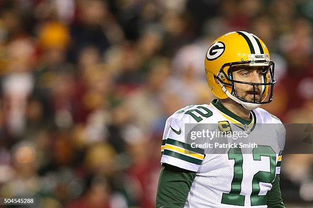 Quarterback Aaron Rodgers of the Green Bay Packers in action against the Washington Redskins during the NFC Wild Card Playoff game at FedExField on...