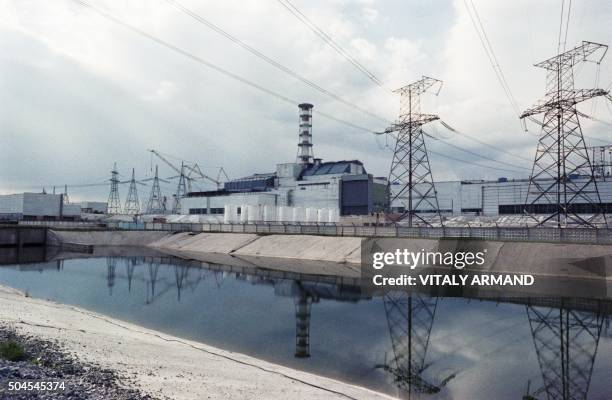 View taken on June 30, 1988 of the Sarcophagus which covers the reactor number four of the Chernobyl nuclear plant which blew up at 1:23 am on April...