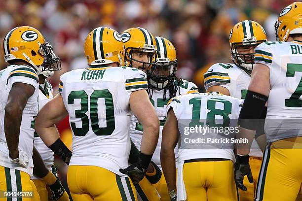 Quarterback Aaron Rodgers of the Green Bay Packers in action against the Washington Redskins during the NFC Wild Card Playoff game at FedExField on...