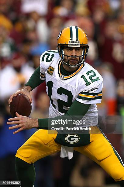 Quarterback Aaron Rodgers of the Green Bay Packers in action against the Washington Redskins during the NFC Wild Card Playoff game at FedExField on...