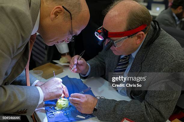 The Hospital for Sick Children head of cardiovascular surgery Dr. Glen Van Arsdell, left, works with Pediatric Cardiac Surgeon Dr. Erle Austin from...