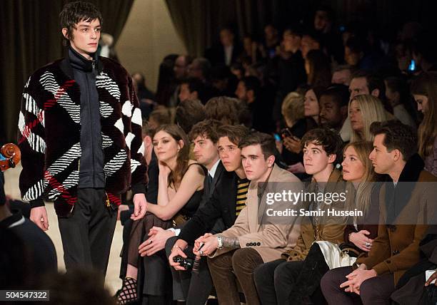 Amber Anderson, Josh Whitehouse, Brooklyn Beckham, Gabriel Day-Lewis, Alex Lawther, Josephine de La Baume and Mark Ronson watch a model walk the...