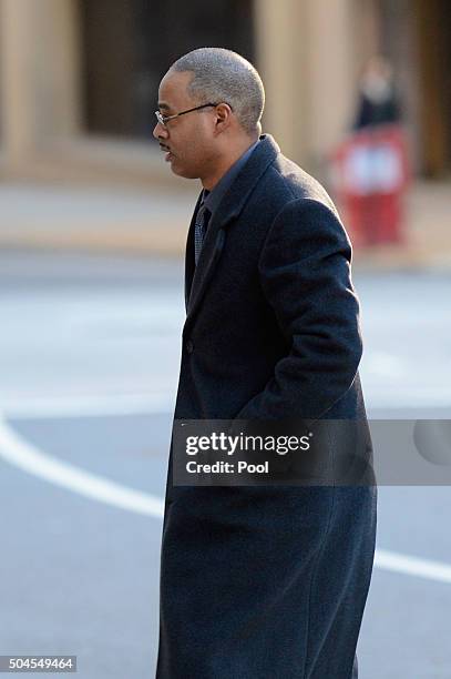 Baltimore Police officer Caesar Goodson walks past Baltimore Sheriff Judical Liaison deputy Donald Rheubottom before entering the Mitchell...