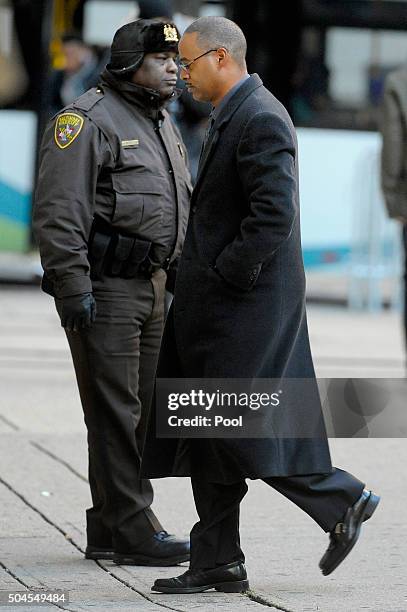 Baltimore Police officer Caesar Goodson walks past Baltimore Sheriff Judical Liaison deputy Donald Rheubottom before entering the Mitchell...