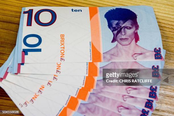 Brixton pound notes, a local currency introduced for use only in the south London borough of Brixton, are displayed for a photograph in Brixton on...