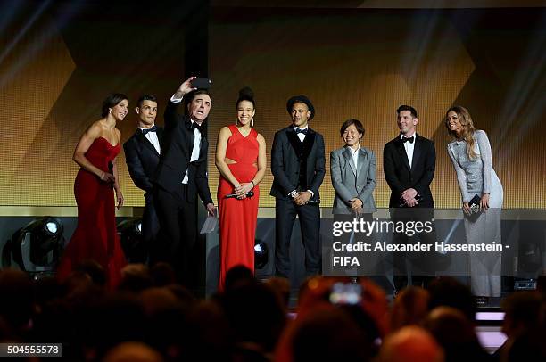 Host James Nesbitt takes a selfie with Carli Lloyd of the United States and Houston Dash, Cristiano Ronaldo of Portugal and Real Madrid, Celia Sasic...