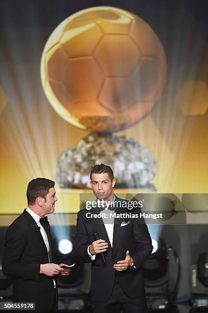 Cristiano Ronaldo of Portugal and Real Madrid is interviewed by host, James Nesbitt during the FIFA Ballon d'Or Gala 2015 at the Kongresshaus on...