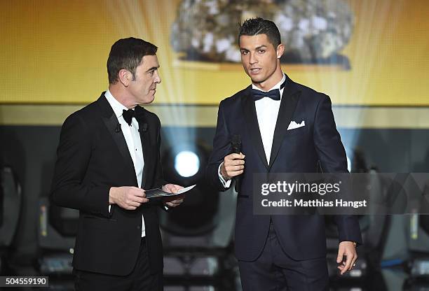 Cristiano Ronaldo of Portugal and Real Madrid is interviewed by host, James Nesbitt during the FIFA Ballon d'Or Gala 2015 at the Kongresshaus on...