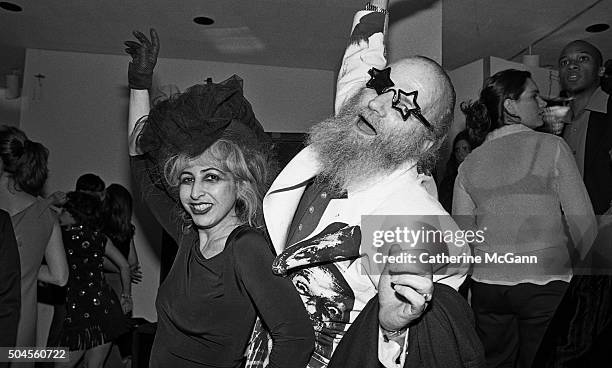 American photographer, filmmaker and lighting designer Billy Name and friend at the opening reception of the exhibit "The Warhol Look: Glamour,...