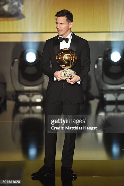 Lionel Messi of Argentina and FC Barcelona receives the Ballon d'or during the FIFA Ballon d'Or Gala 2015 at the Kongresshaus on January 11, 2016 in...