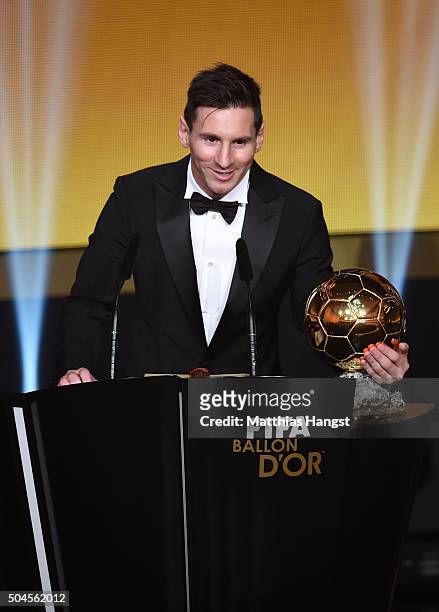 Lionel Messi of Argentina and FC Barcelona receives the Ballon d'or during the FIFA Ballon d'Or Gala 2015 at the Kongresshaus on January 11, 2016 in...