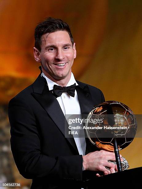 Ballon d'Or winner Lionel Messi of Argentina and Barcelona accepts his award during the FIFA Ballon d'Or Gala 2015 at the Kongresshaus on January 11,...