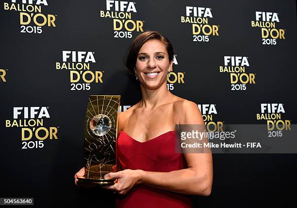 Women's World Player of the Year winner Carli Lloyd of the United States and Houston Dash poses with her award after the FIFA Ballon d'Or Gala 2015...