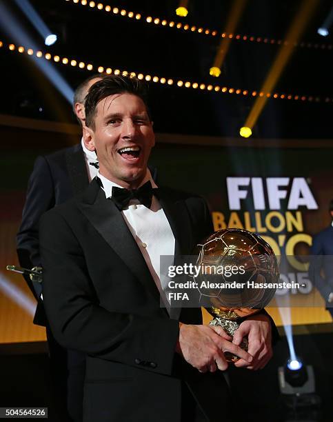 Ballon d'Or winner Lionel Messi of Argentina and Barcelona poses with his award after the FIFA Ballon d'Or Gala 2015 at the Kongresshaus on January...