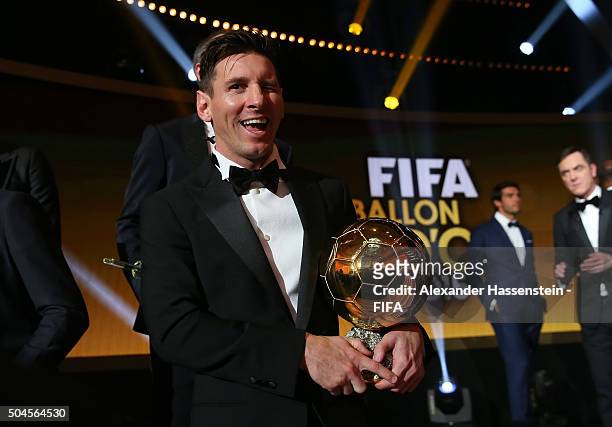 Ballon d'Or winner Lionel Messi of Argentina and Barcelona poses with his award after the FIFA Ballon d'Or Gala 2015 at the Kongresshaus on January...
