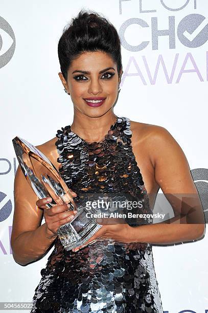 Actress Priyanka Chopra poses for photos in the press room during the People's Choice Awards 2016 at Microsoft Theater on January 6, 2016 in Los...