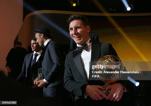 Ballon d'Or winner Lionel Messi of Argentina and Barcelona poses with his award after the FIFA Ballon d'Or Gala 2015 at the Kongresshaus on January...