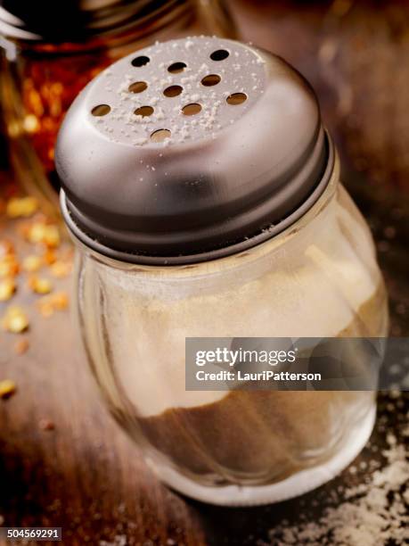 parmesan cheese and chili flakes shakers - pepper pot stock pictures, royalty-free photos & images