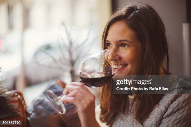 pretty happy woman drinking wine - red wine foto e immagini stock