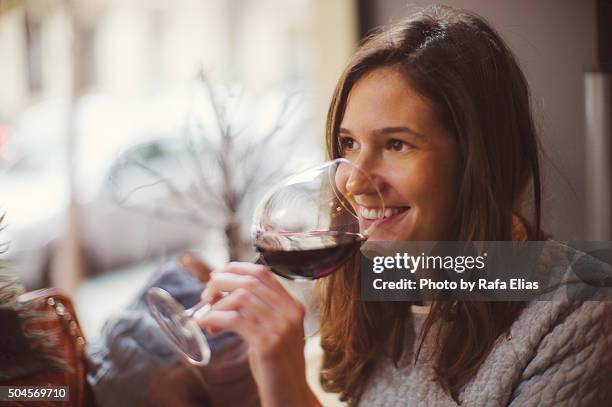 pretty happy woman drinking wine - red wine bildbanksfoton och bilder