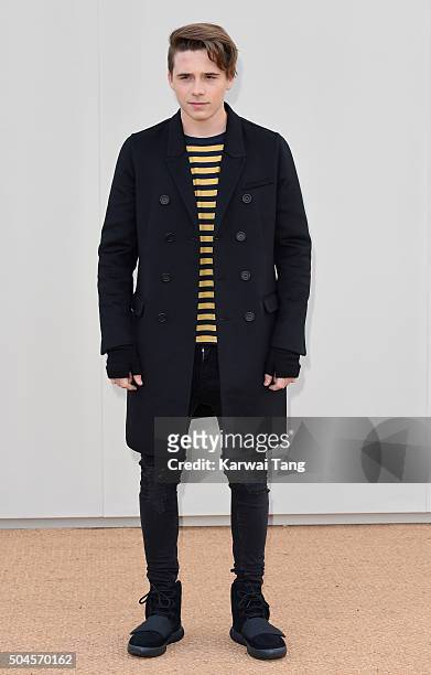 Brooklyn Beckham attends the Burberry show during The London Collections Men AW16 at Kensington Gardens on January 11, 2016 in London, England.