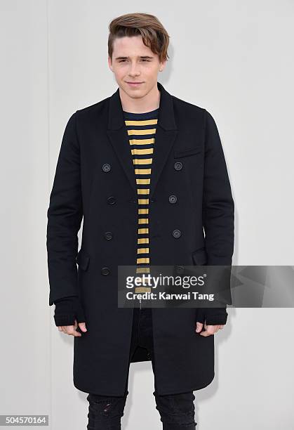 Brooklyn Beckham attends the Burberry show during The London Collections Men AW16 at Kensington Gardens on January 11, 2016 in London, England.