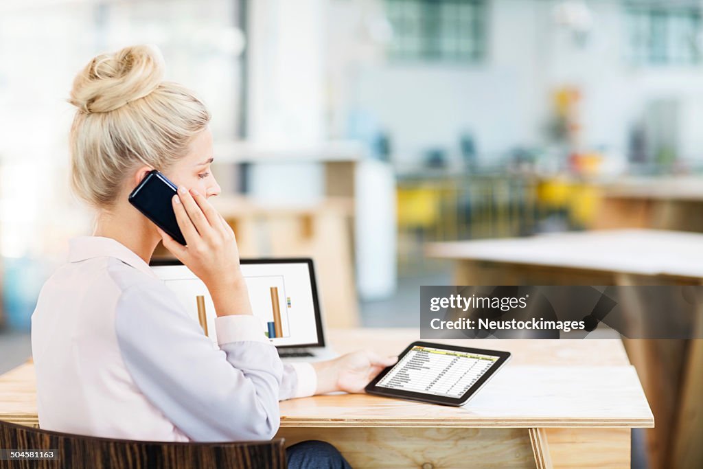 Fast Multitasking Phone Businesswoman Multitasking Answering Smart Phone While Using Digital ...