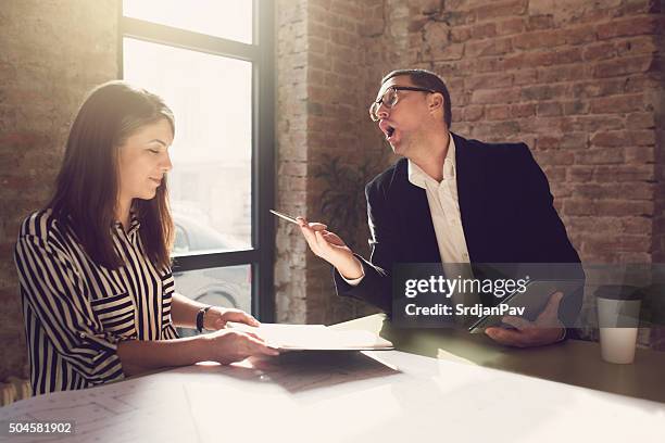dealing with a bad boss - bazig stockfoto's en -beelden