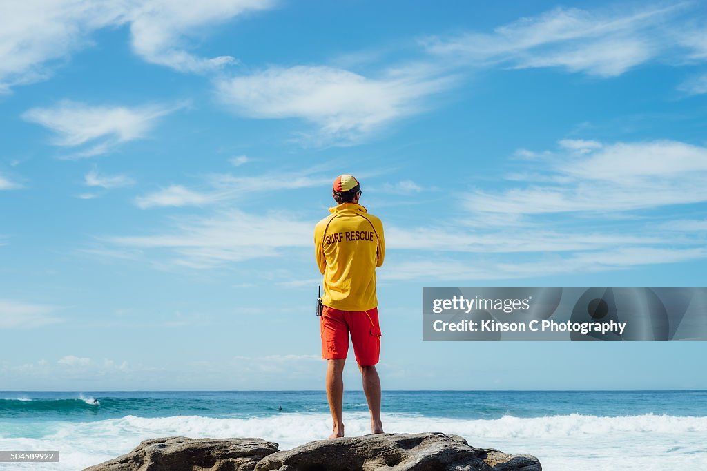 Surf Guard Overlooking The Ocean