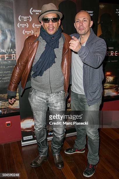 Julien Seri and Didier Morville a.k.a. JoeyStarr attend the 'Night Fare' premiere at Drugstore Publicis Cinema on January 11, 2016 in Paris, France.