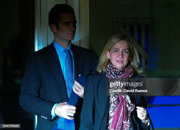 Princess Cristina de Borbon and her husband Inaki Urdangarin leave the courtroom at the Balearic School of Public Administration for summary...