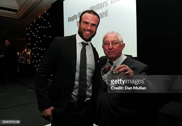 Dave Townsend is presented with Rugby Union Writers' Club Tankard Award by Jamie Roberts of Harlequins during the Rugby Union Writers' Club Annual...