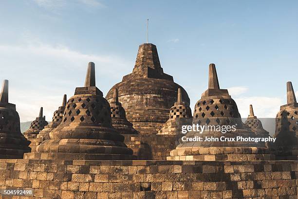 borobudur stupas - borobudur temple stock pictures, royalty-free photos & images