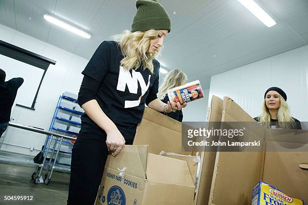 Islanders players wife Megan Bailey attends 2016 Henrik Lundqvist Foundation Food Bank For New York City Repack Day Challenge at Food Bank for New...