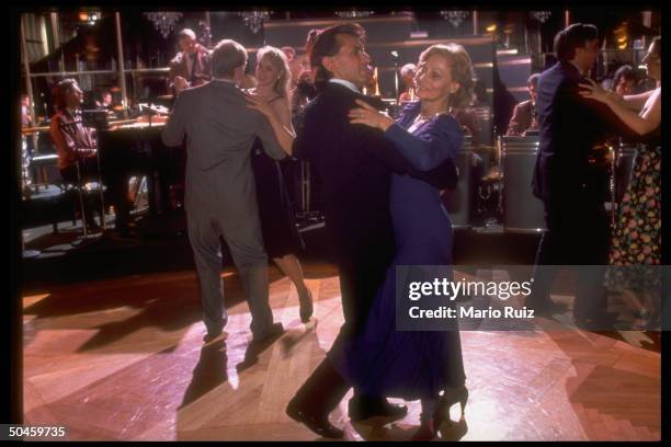 Couples dancing, ballroom style, at the recently renovated Rainbow Room nightclub.