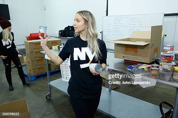 Islanders players wife Cassie Clutterbuck attends 2016 Henrik Lundqvist Foundation Food Bank For New York City Repack Day Challenge at Food Bank for...