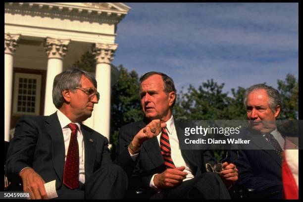 Pres. George Bush during his education summit, flanked by Educ. Secy. Cavazos, , & NM Gov. Garrey Carruthers, , at the University of Virginia.