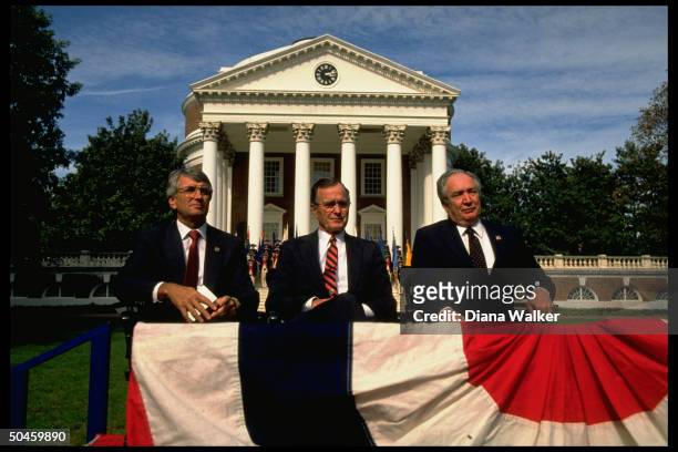Pres. Bush during his education summit, flanked by Educ. Secy. Cavazos, , & NM Gov. Garrey Carruthers, , at the University of Virginia.