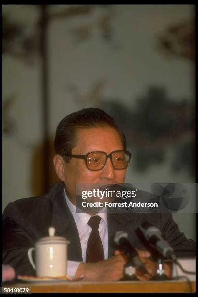 Politburo member Qiao Shi at press conference.